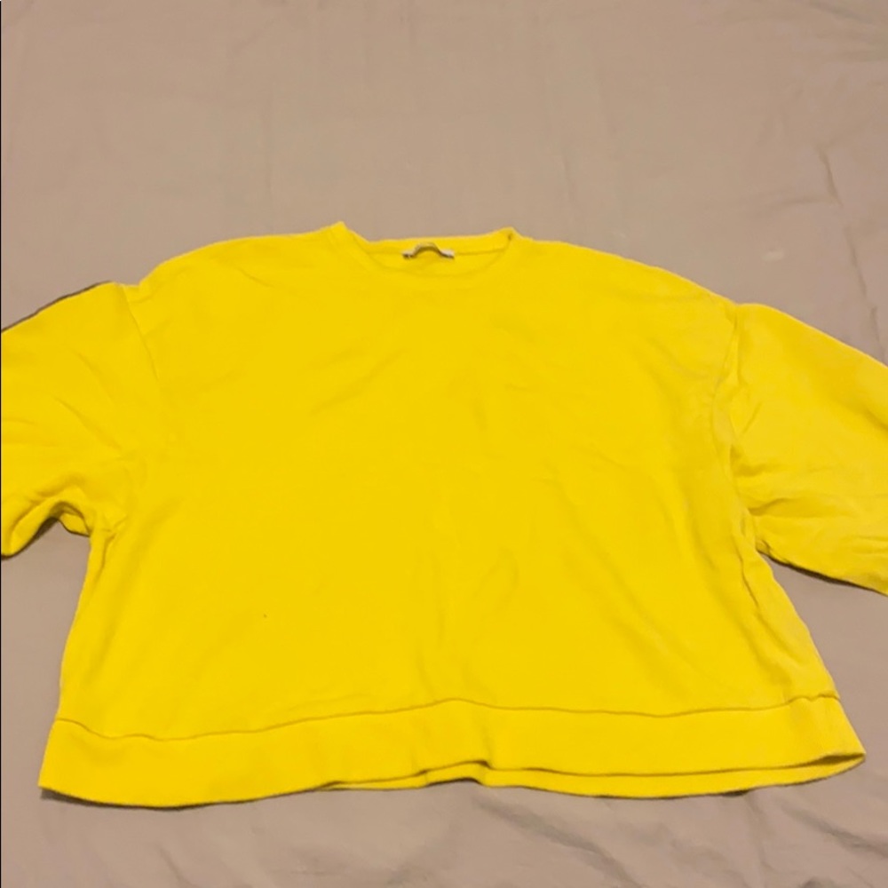 Yellow oversized sweatshirt with black trim